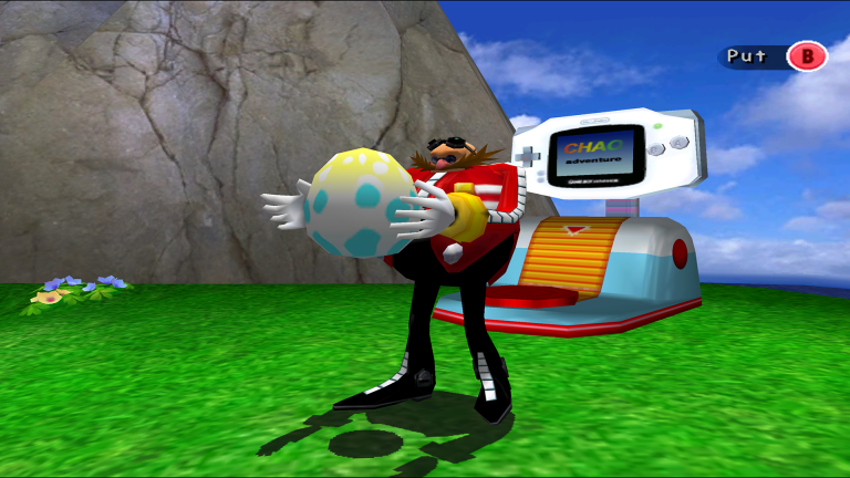Dr. Eggman hält ein Chao-Ei vor der GBA-Transferstation im Chao-Garten von Sonic Adventure 2 Battle.